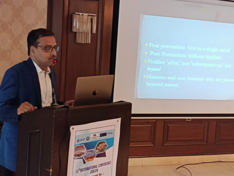 Delivering a key note address in an international conference